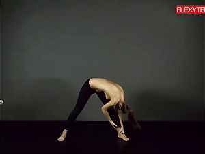 brown-haired gymnast flashing of her arse